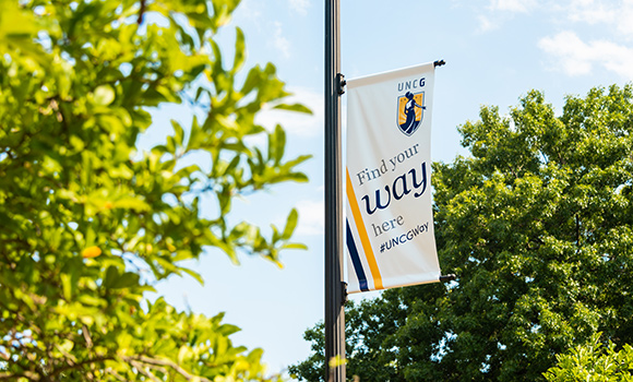 Photo of Find your way here banner on campus