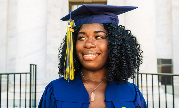 Photo of Brittney Gray in cap and gown