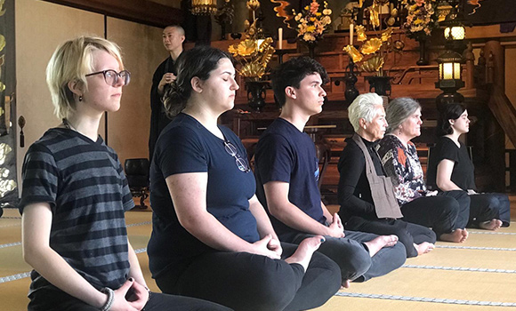 Photo of group of people meditating