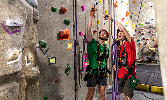 Photo of students at the rock wall