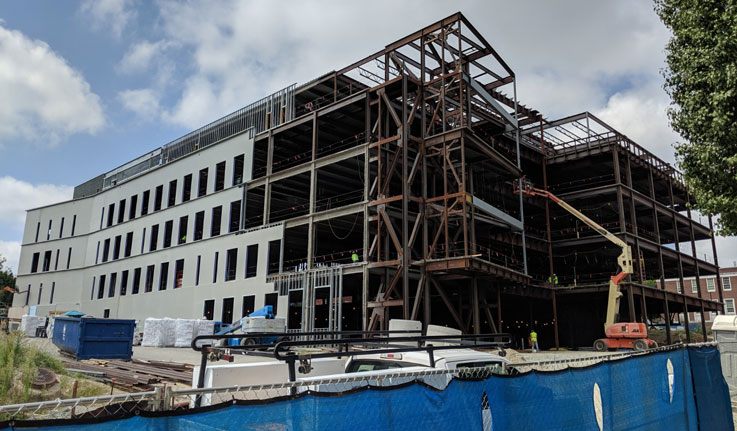 Photo of the Nursing and Instructional Building under construction