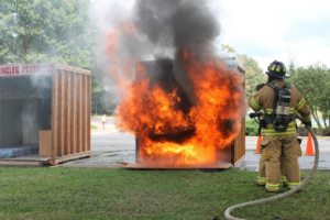 Photo of a firefighter fighting fire