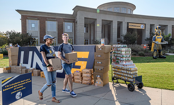 Photo of students with canned goods on campus