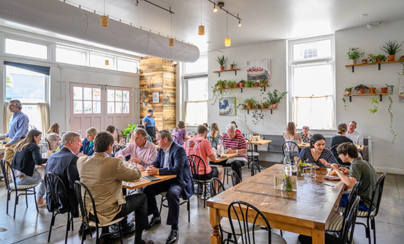 Photo of people eating at restaurant