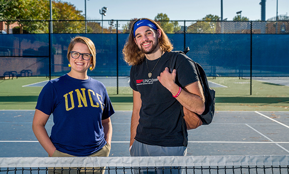 Photo of Lindsey Oakes and Brandon Baldwin on tennis courts