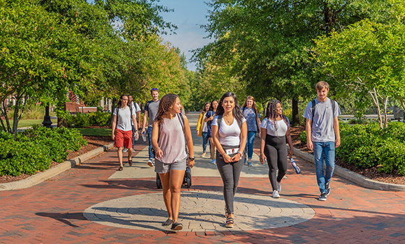 Photo of students walking on College Avenue on campus