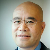 portrait of Dr. Qibin Zhang smiling
