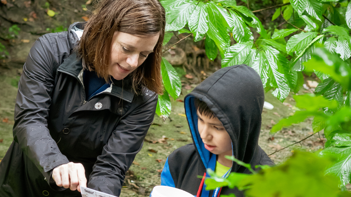 woman with child at bog