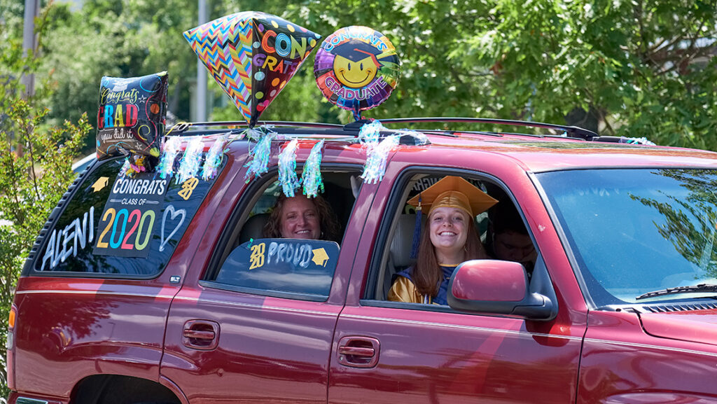 Family in decorated car