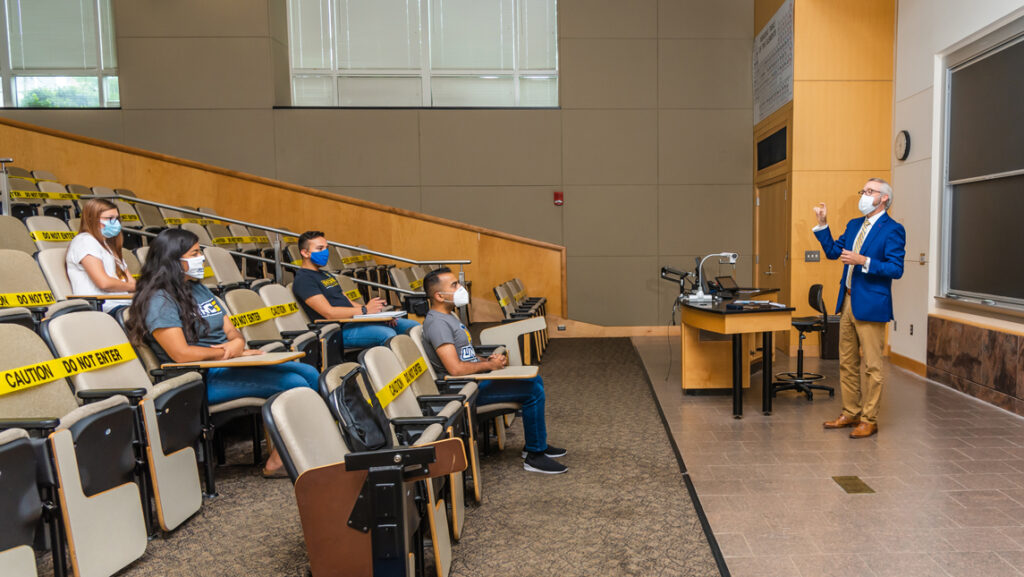 socially distanced lecture with face coverings