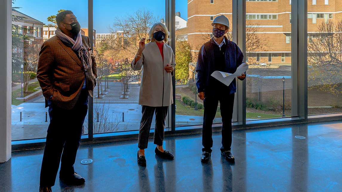 Photo of people talking in new building