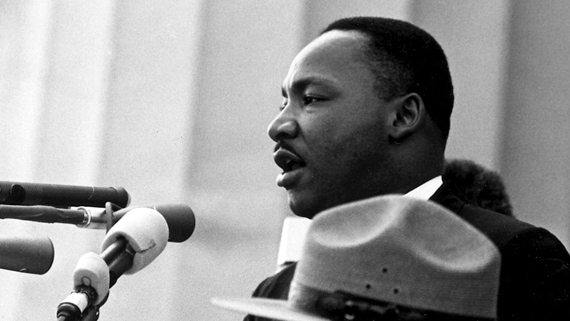 Dr. King talking at podium