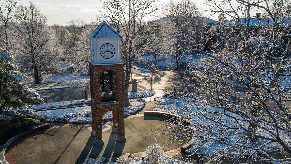 Clocktower and snowy campus