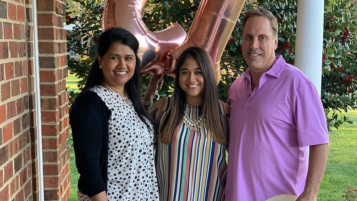 Photo of student with her parents