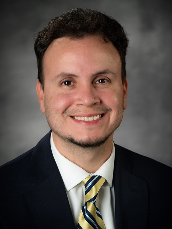 Head shot of Augusto Peña