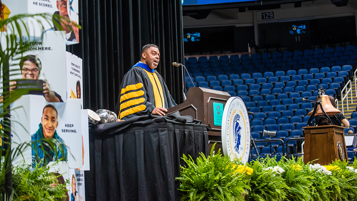 Chancellor Gilliam speaking on stage at Commencement