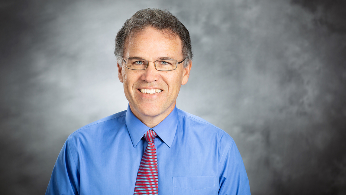 Editorial portrait of Dr. Greg McAvoy