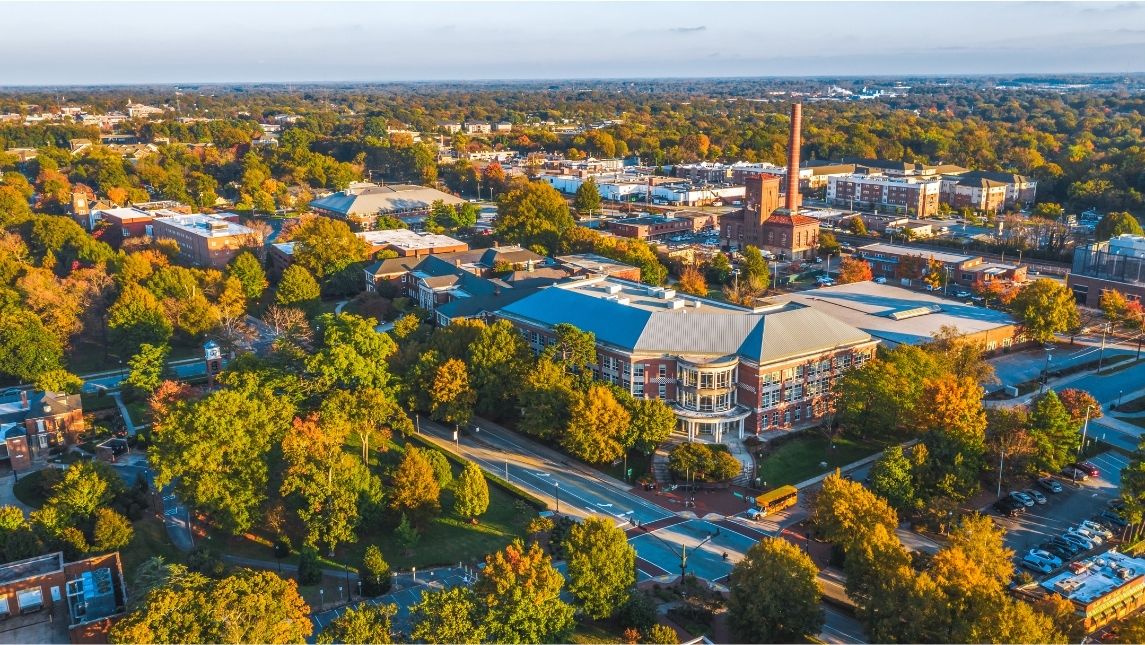 aerial image of campus with fall foliage
