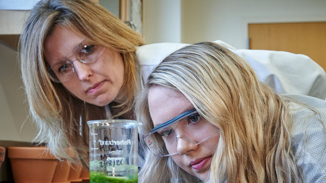 Board of Governor's Teaching Excellence honoree Dr. Nadja Cech in her lab with a UNCG student.