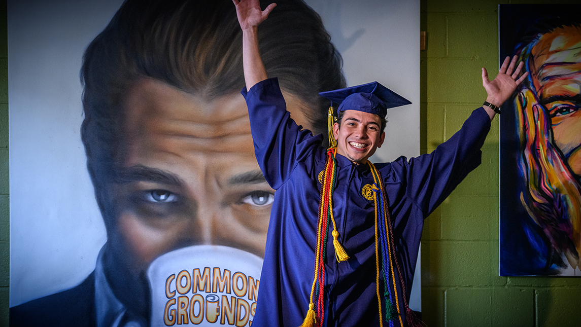 Colby Borges in his cap and gown in Common Grounds