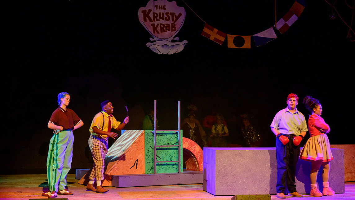Poisson as Mr. Krabs in "Spongebob: The Musical" with his castmates