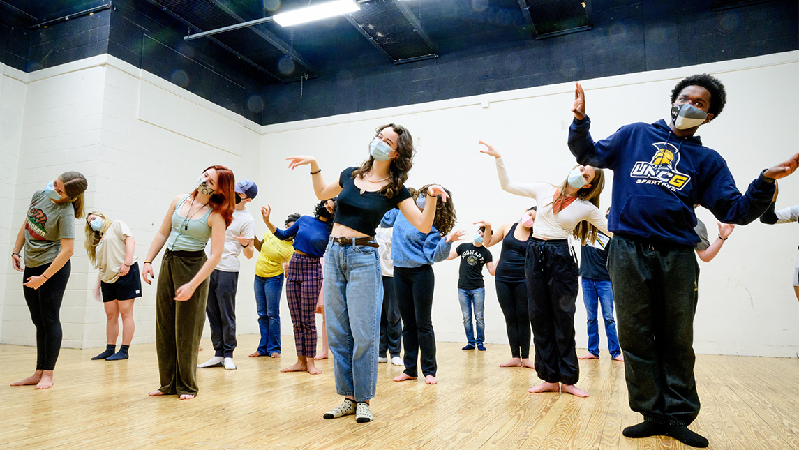 Theatre students in masks during class