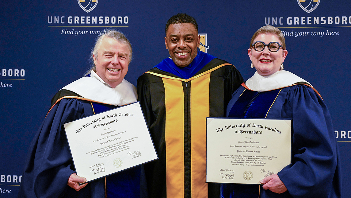 Dennis and Nancy King Quaintance with Chancellor Gilliam holding their honorary degrees