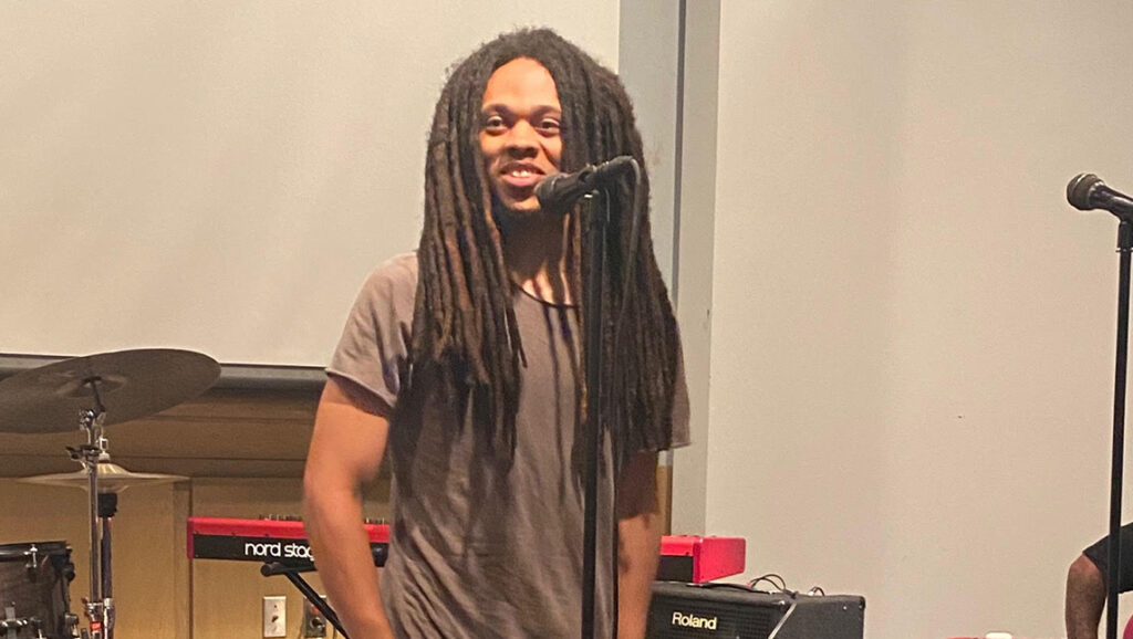 Isa Meachum, the son of musician Lorenzo "Logie" Meachum, speaks at 2022 Juneteenth Celebration