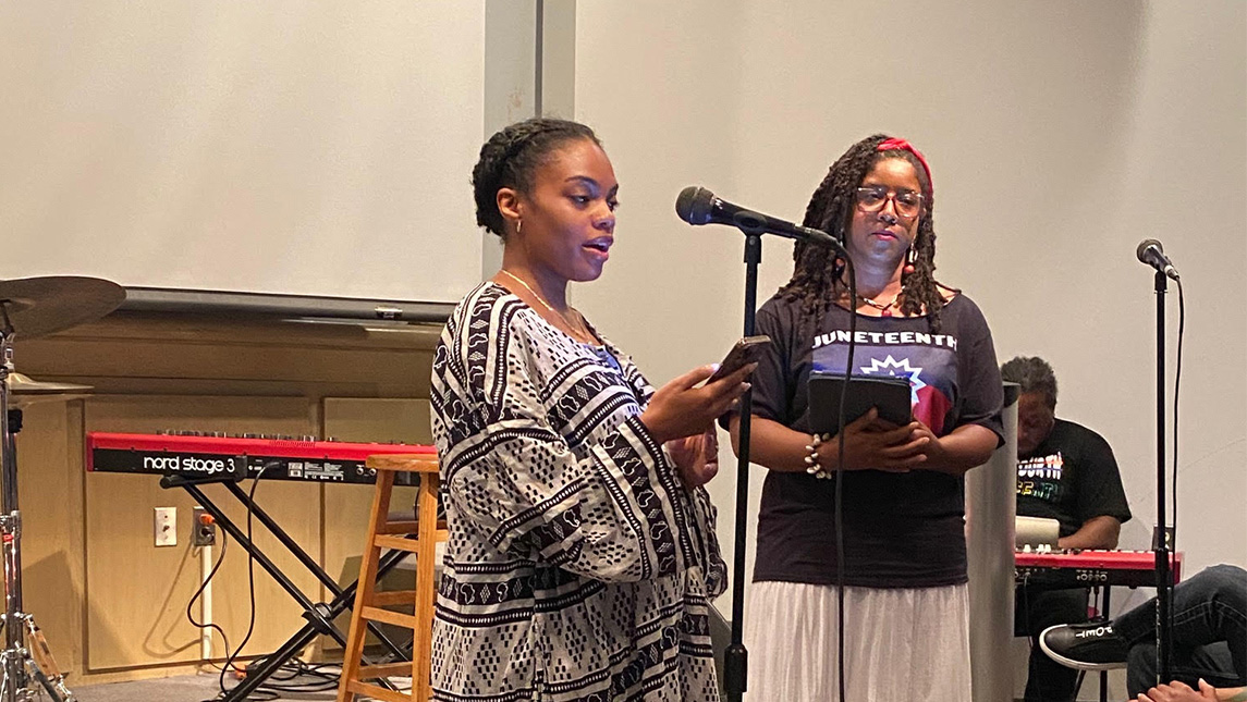 UNCG student Faith Howell speaks at the Juneteenth Celebration with Dr. Christina Yongue