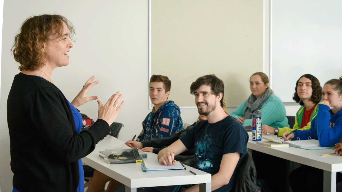 Students talking with professor