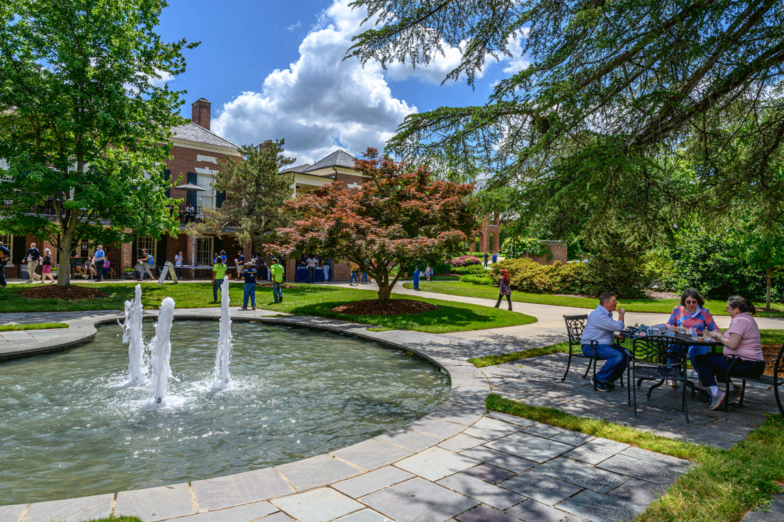 fountain, people at a table