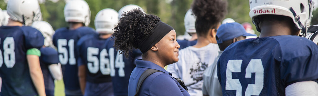 MSAT students working with Grimsley high school football teams during pre-season workouts/scrimmages.
