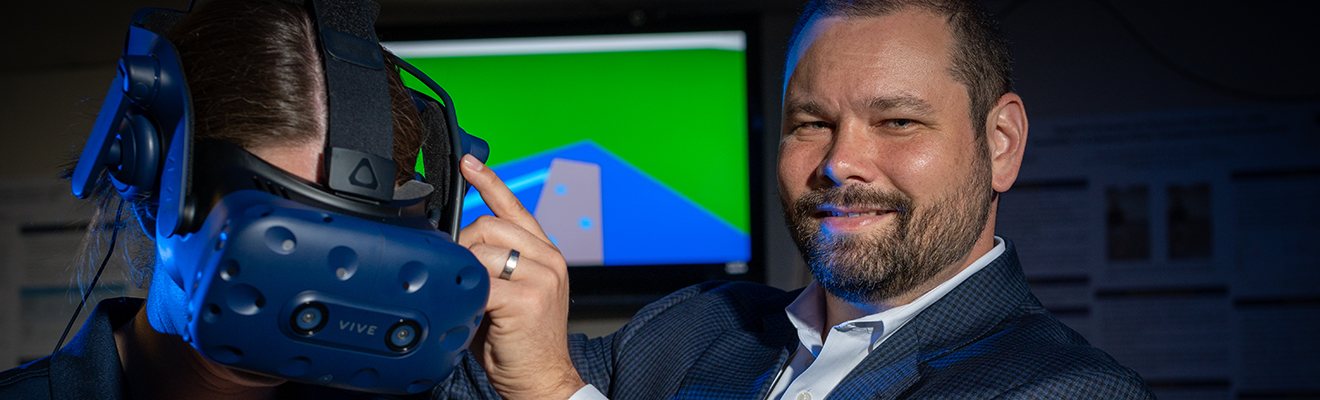 UNCG Research magazine, Christopher Rhea, Ph.D.