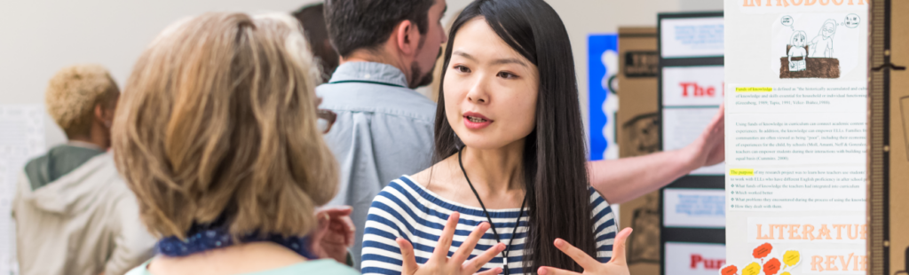 A student presents research at the 2018 Triad Teacher Researcher Conference