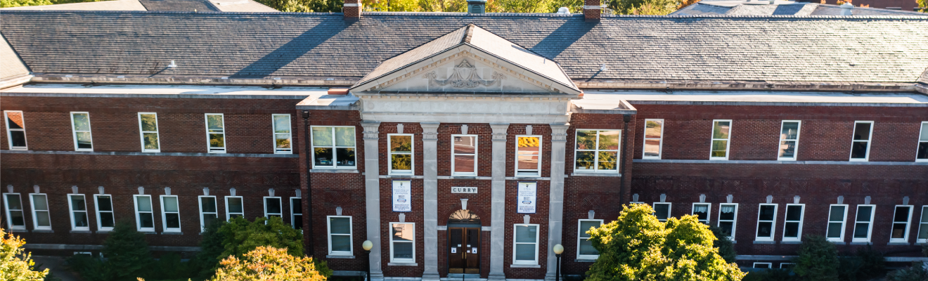 Aerial shot of the Curry Building on the UNCG campus