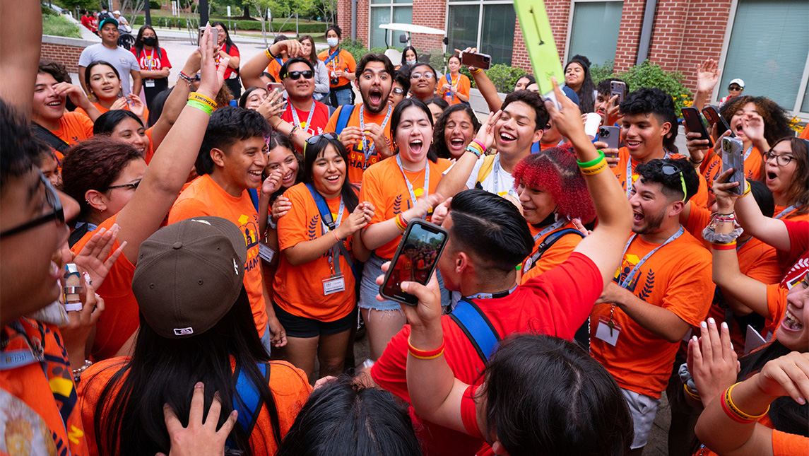 New UNCG students huddle together during CHANCE camp.