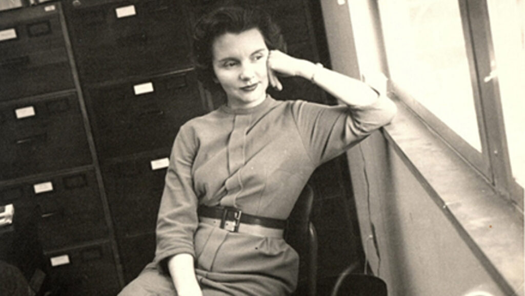 Ann Satterwhite Tunstall sits beside a window.