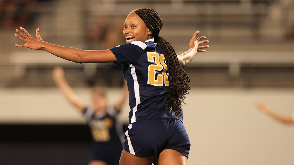 Soccer player Nadia Wilson celebrates a goal during game against Wofford during 2022 Homecoming.
