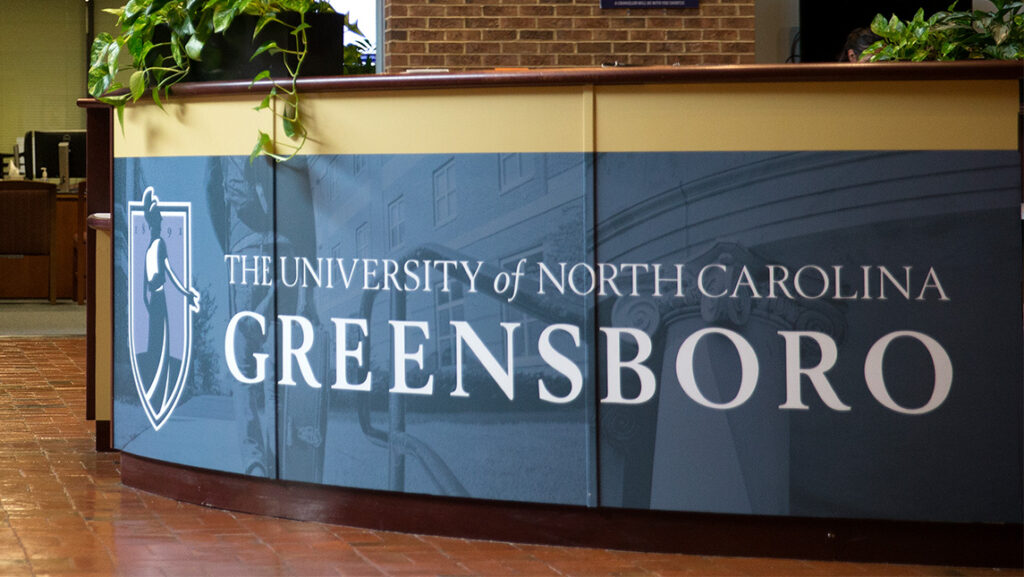 The front desk at the UNC Greensboro Mossman Administration building.