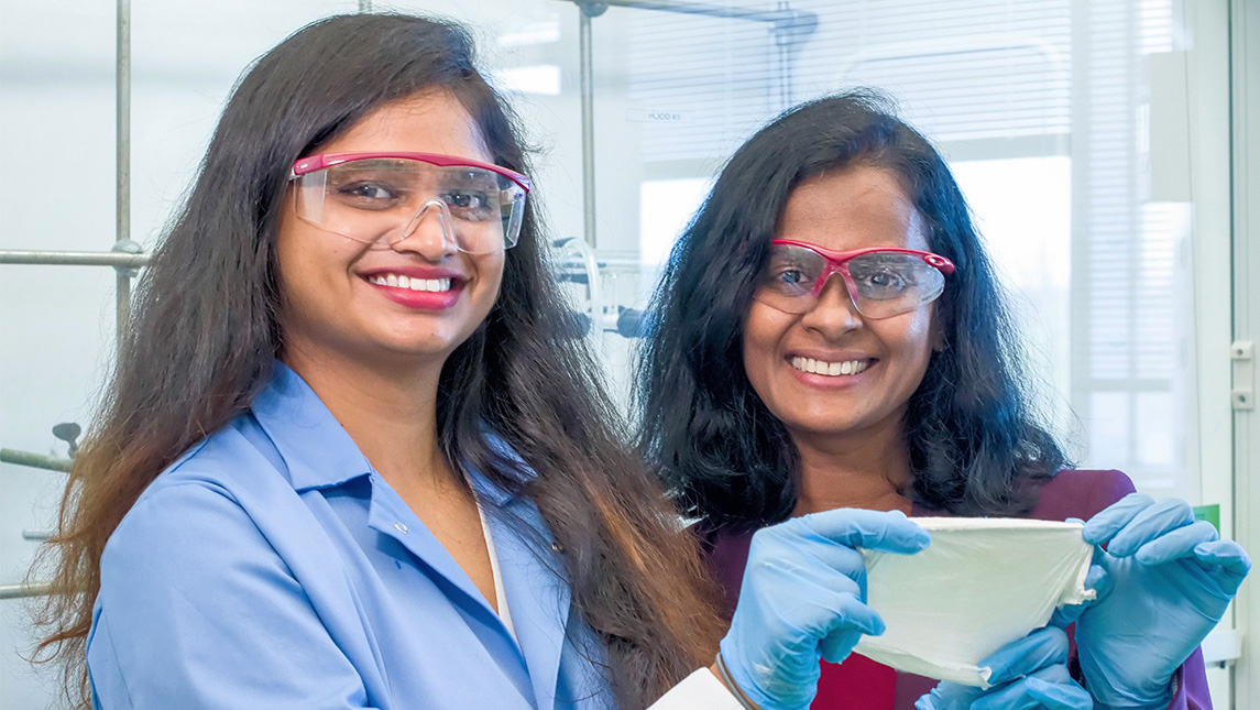 Dr. Sheeba Dawood and Dr. Hemali Rathnayake hold up a filter they created to extract lithium.