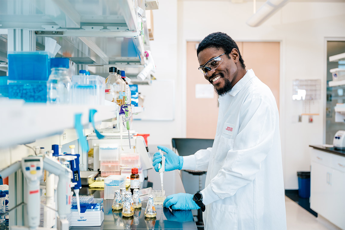 Fifth-year JSNN doctoral student Theo Noussi studies how bacteria react to substances such as antibiotics that they encounter in their environment.