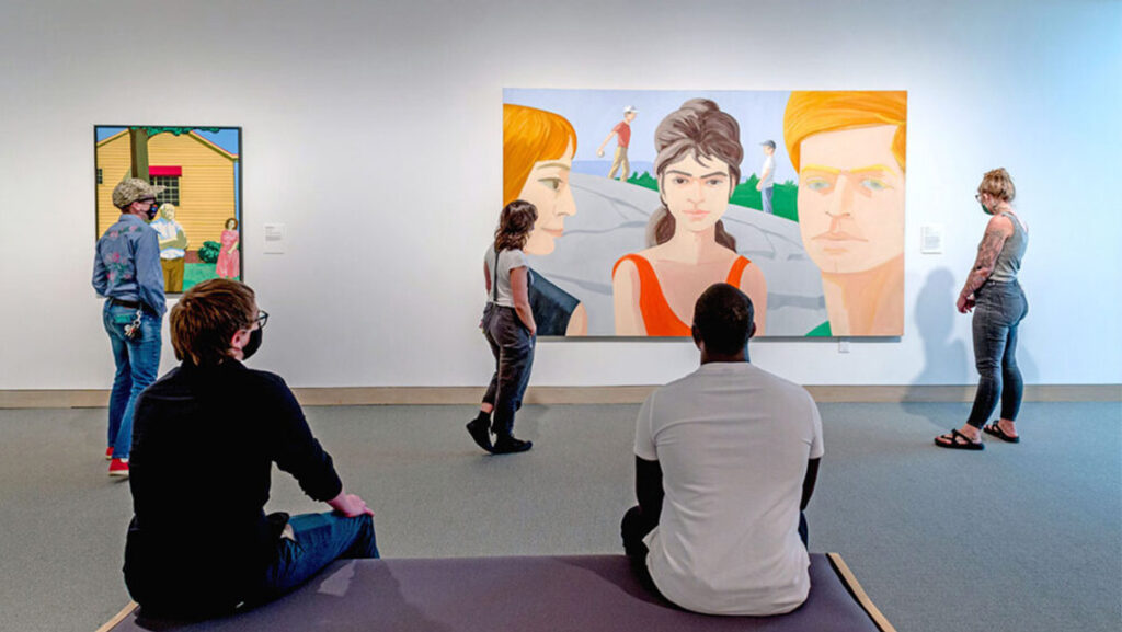 Students look at the art inside the Weatherspoon Art Museum gallery.