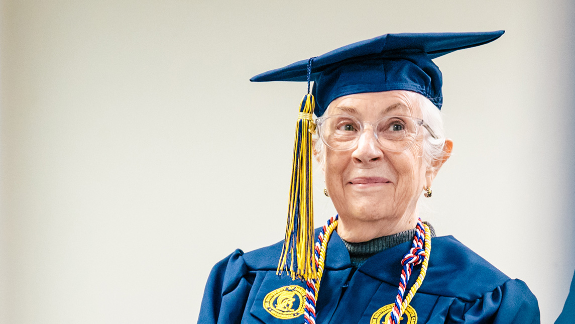 Bonnie Miller beams after receiving her LLC diploma at 80 years old.