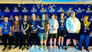Winners of the October 2022 Spartan Clash Fortnite tournament line up with their medals to celebrate.