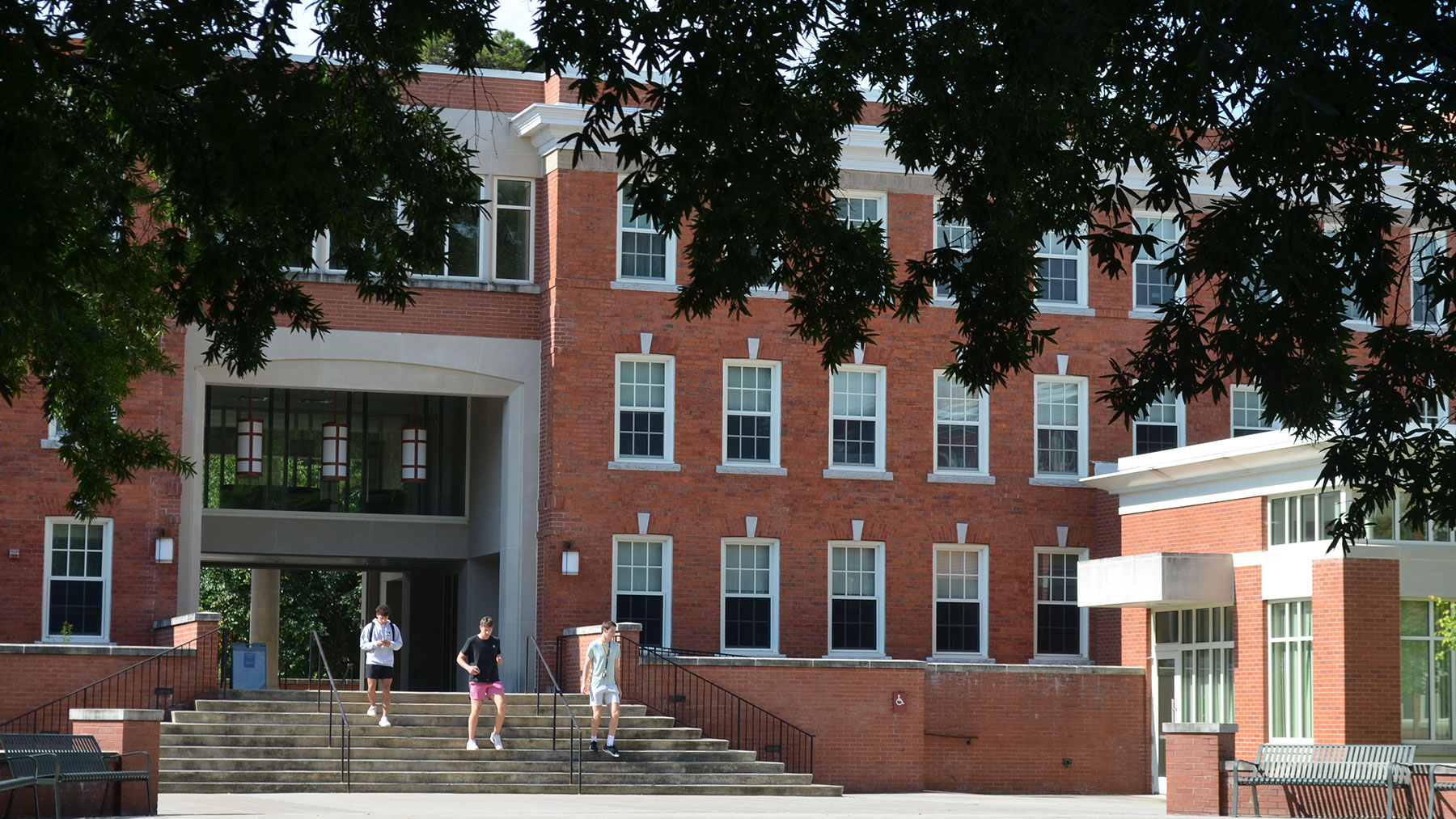 Students entering the UNCG Quad on campus.