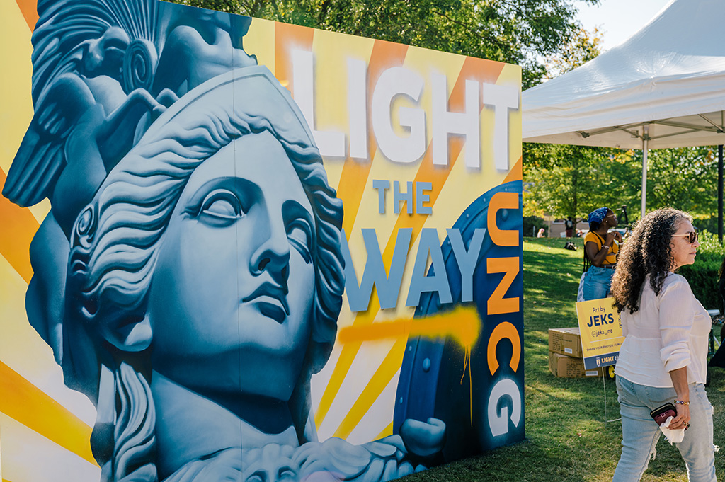 Light the Way mural created by Jeks at the 2022 Homecoming Block Party.