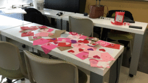 Valentines day card on a desk.