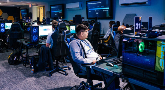 Faculty in the esports center learn to use the Unreal Engine.