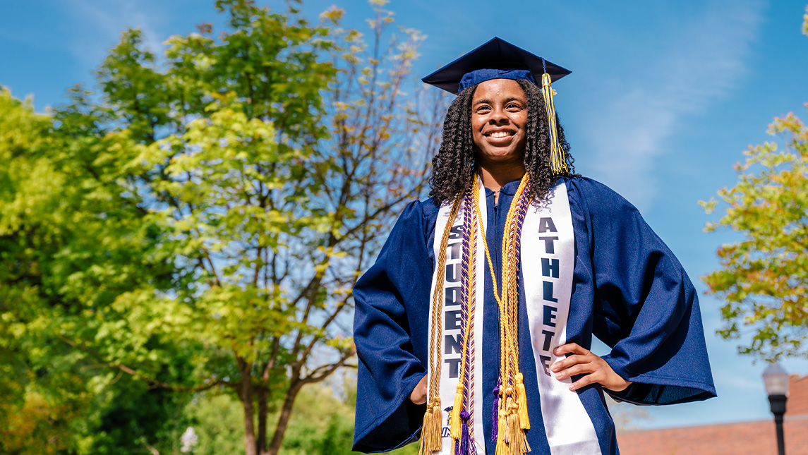 UNCG's Excellanxt Greer in her cap and gown