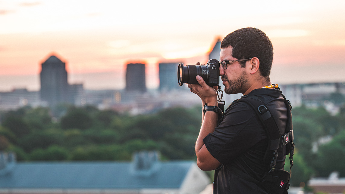 UNCG photographer Sean Norona takes a picture of the skyline.